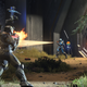 Spartan soldiers shoot runs at each other in big team battle in Halo Infinite.